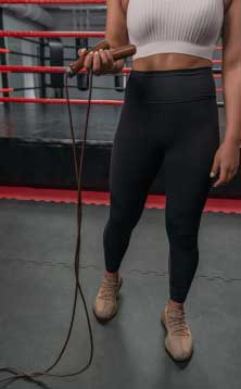 An athlete holding a jumping rope