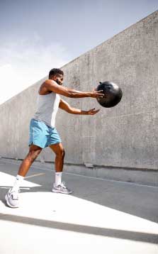 An athlete with an exercise ball