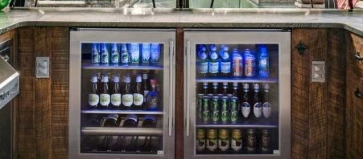 An outdoor beverage fridge filled with drinks